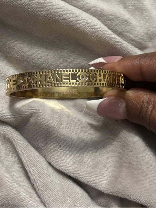 Inspired Gold-Tone Cutout Logo Bangle Bracelet