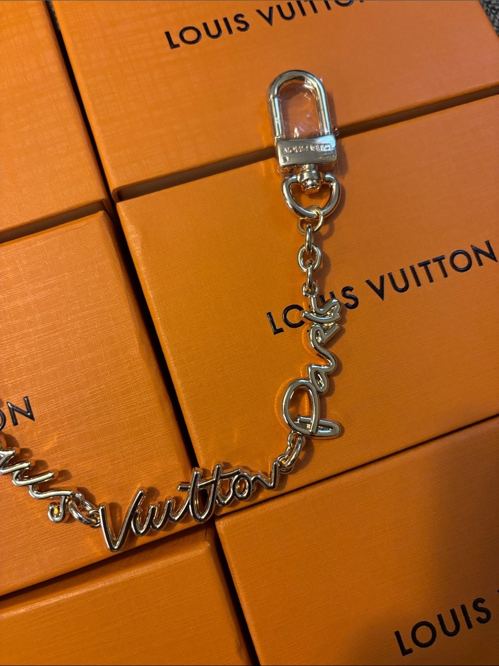 LV Gold Script Logo Chain Key Holder